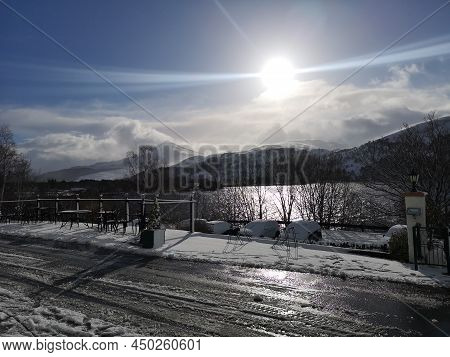 A View Across Loch Rannoch Toward The Mountain Of Schiehallion In Highland Perthshire During Winter 