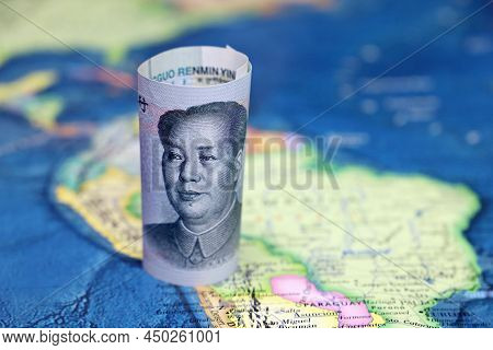 Chinese Yuan On The Map Of South America. Trading Between China And Latin American Countries, Econom