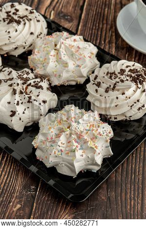 Meringue Cookies Or Beze Cookies With Candy And Chocolate