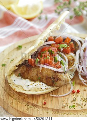 Traditional Menu From Cyprus,minced Meat (lamb,pork),herbs,onion,formed As A Small Sausage And Wrapp