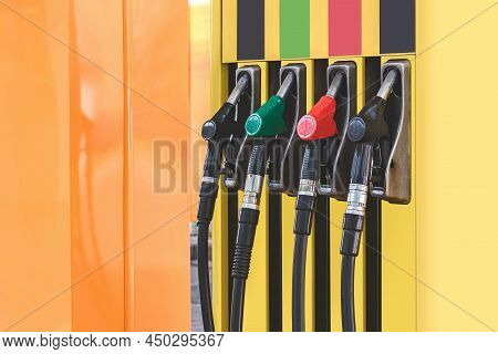 Petrol Station With Colored Guns And Fuel Hoses. Gasoline, Diesel, Eco Hydrogen Refueling Column.. C