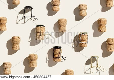Creative Pattern With Champagne Cork On Beige Background With Hard Light And Shadows At Sunlight. Mi