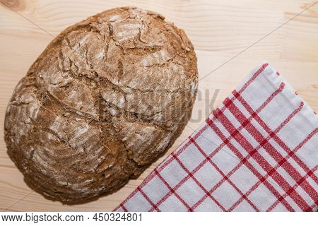Fresh Farmer's Bread With Tea Towel - Bread Crust Of Sourdough Bread