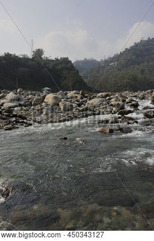 Mountain Stream (balason River) Flowing Down To The Gangetic Plain From Himalayan Foothills In The T