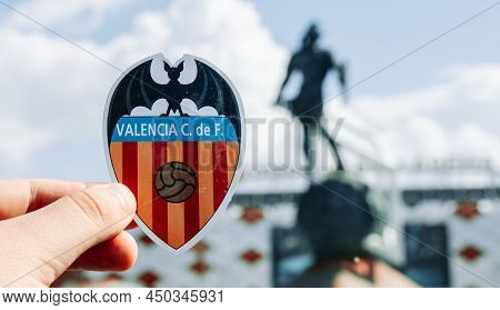 June 14, 2021, Valencia, Spain. The Emblem Of The Football Club Valencia Cf Against The Background O