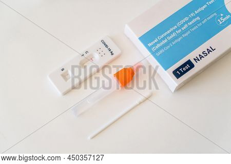 Covid-19 Rapid Antigen Test Kit With Casette, Test Tube And Nasal Swab. Negative Result. Self Testin