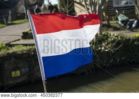 Red White Blue Dutch Flag Hangt Outdoor On Sunny Spring Day, King Day