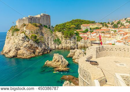 Aerial View On Top Walls Of Dubrovnik City Of Croatia. Looking Fort Lovrijenac Fortress, Over The We