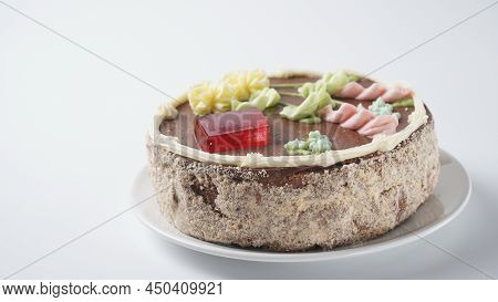 A Kyiv Cake On A Blue Plate. It's A Brand Of Dessert Cake Made In Kyiv, Ukraine. Kyiv Cake With Choc