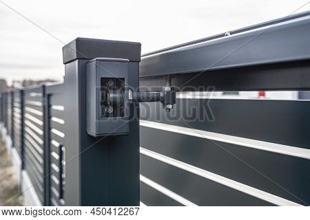 Modern Sliding Entrance Gate In Anthracite Color, Visible Upper Guide Rollers.