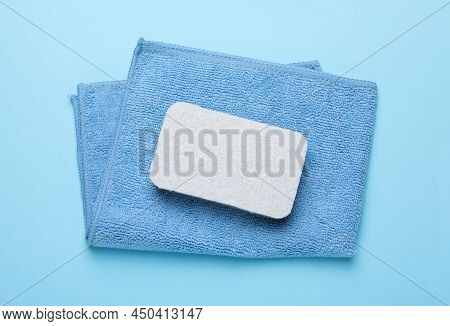 Sponge And Rag On Light Blue Background, Top View