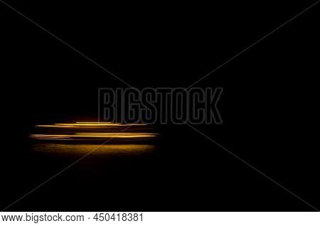 Abstract Image Of A Ship Sailing The Sea At Night. Canary Islands. Spain.