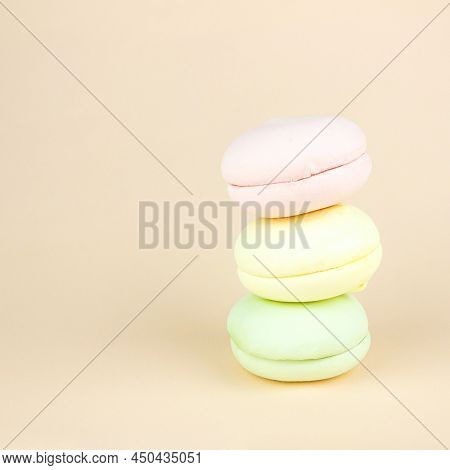 Sweet And Colourful Marshmallows Looks Like French Macaroons On Pastel Cream Background. Brignt Maca