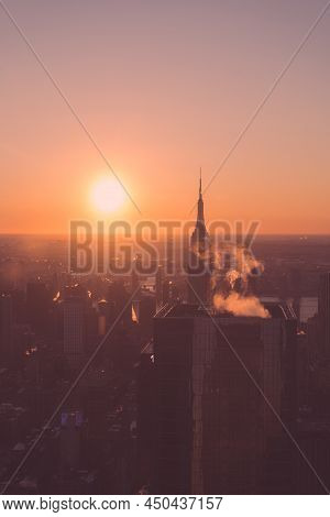 The Silhouette View Of Empire State During A Sunrise