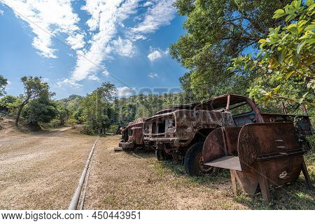 Kanchanaburi Thailand-jan 16,2022 : Pilok Old Mines And Old Machines Laid Out On The Ground After Th