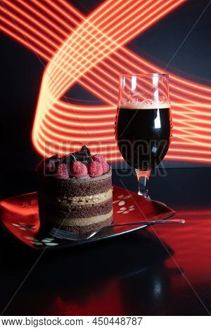 Chocolate Stout Beer With Chocolate Cake And Raspberries