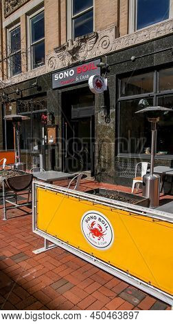 NORWALK, CT, USA - MARCH 3 2022: Sono Boil Crawfish and crab restaurant in downtown at  Washington street in nice sunny day