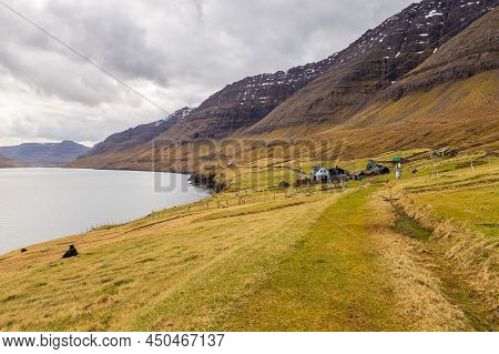 View Of The Muli On Bordoy Island. A Small Village Situated On The Slope Of A Hill. Faroe Islands.