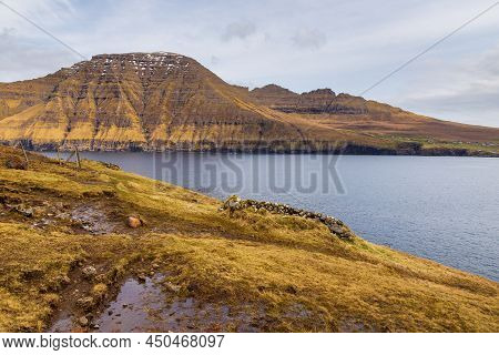 Steep Coast Of The Island Of Bordoy. Volcanic Archipelago In The Atlantic Ocean, Muli, Faroe Islands