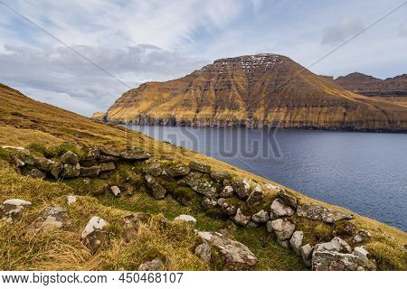 Steep Coast Of The Island Of Bordoy. Volcanic Archipelago In The Atlantic Ocean, Muli, Faroe Islands