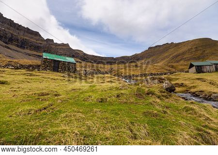 View Of The Muli On Bordoy Island. A Small Village Situated On The Slope Of A Hill. Faroe Islands.