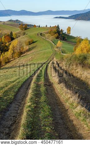 Morning Foggy Clouds In Autumn Mountain Countryside.  Ukraine, Carpathian Mountains, Transcarpathia.