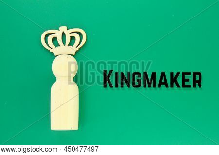Peg Doll With A Crown On The Head And The Word Kingmaker