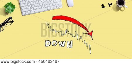 Market Down Trend Chart With A Computer Keyboard And A Mouse