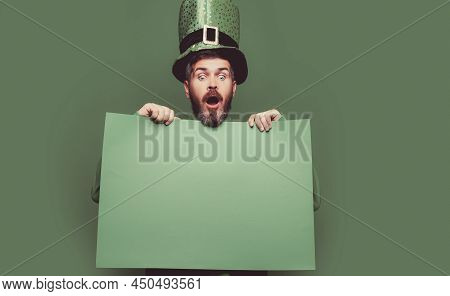 Man On Green Background Celebrate St Patricks Day. Green Patricks Background. Copy Space.
