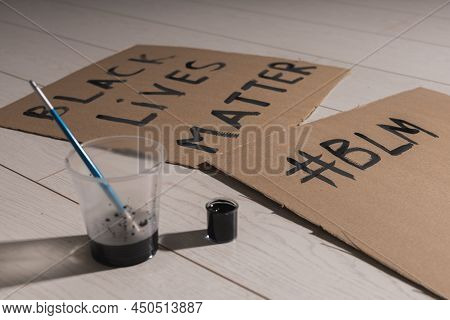 Black Lives Matter And Fight Against Racism And Write Sign And Words On Cardboard - Protest Concept 