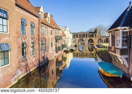 Old Houses And Historic City Gate At The Berkel River In Zutphen, Netherlands
