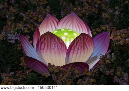 Red Lotus Shaped Lantern In Backyard Flower Garedn