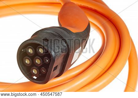 A Colored Charging Cable For Electric Cars Against A White Background.