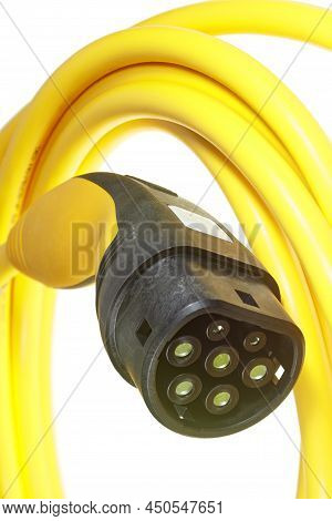 A Colored Charging Cable For Electric Cars Against A White Background.