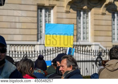 Strasbourg, France - Mar 6, 2022: Man Proteting With Ukraine Flag In Hands In Front Of Russian Consu