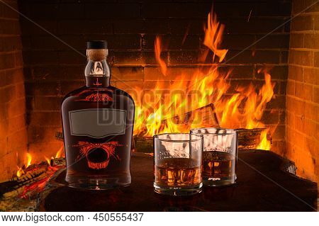 No Logo. No Trademark. View Of A Bottle Of Rum With An Empty Label And Two Glasses Of Rum With Ice I
