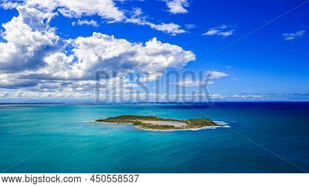 Islet In Atlantic Ocean. Small Atoll In Ocean. Tropical Bliss In Carribbean Land. View On Island Fro