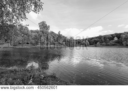 View Of The Autumn Colours Around The Lake At Stourhead Gardens In Wiltshire