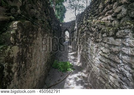Narrow Path Leading To Arch At Maya Ruins 'cahal Pech' In San Ignacio, Belize
