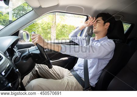 Tired Young Asian Businessman Sleeping In Car, Hard Work Causes Poor Health, Sit Asleep While The Ca