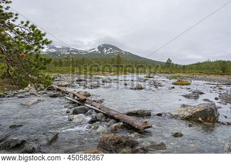 View Of The Hiking Trail To The Lake Blavatnet, Stones And River, Lyngen Alps, Norway