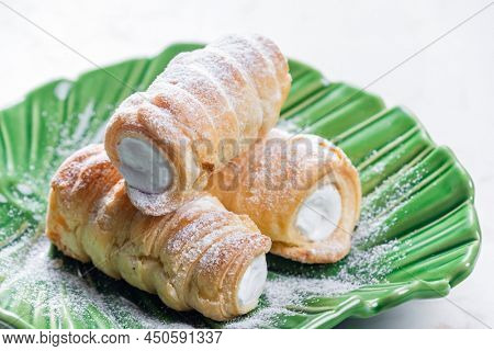 dessert called kremrole filled with cream