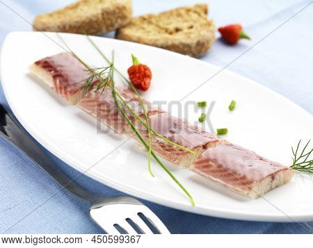 Smoked Eel Served With Chive And Slicy Pepper
