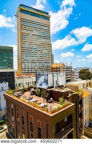 TEL AVIV, ISRAEL - JUNE 2, 2021: Israel. The famous building Migdal Shalom, in the past - the tallest building in the Middle East. Summer morning. Shooting from the balcony of a luxury hotel