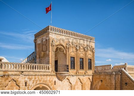 Famous Midyat Guest House in Midyat city, Mardin province, Turkey. Traditional architecture of the Midyat Konuk Evi building at sunny day.