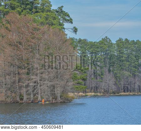 Beautiful Ratcliff Lake With A Kayaker In The Distance At Ratcliff Lake Recreation Area, Ratcliff, T