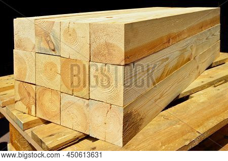 Pine Lumber Stacked In A Row At The Sawmill, Lumber Stack For Storage Construction Or Industrial Wor
