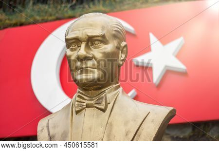 Ataturk Bust With Turkish Flag On Background,  Statue Of Ataturk, The First President And Founder Of