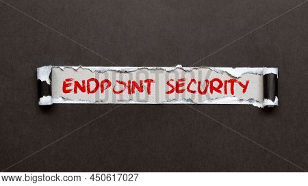 Torn Paper Strip On Yellow Background With Text Endpoint Security.