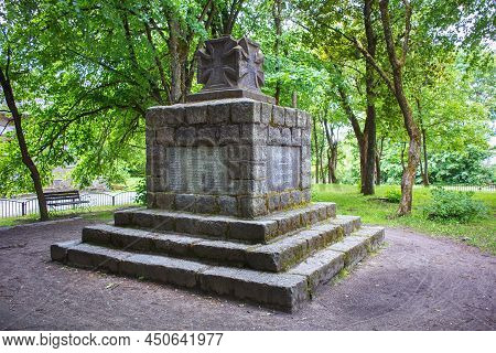 Krasnolesye, Russia - June 12, 2016: Monument With The Iron Cross To The Memory Of The Fallen German